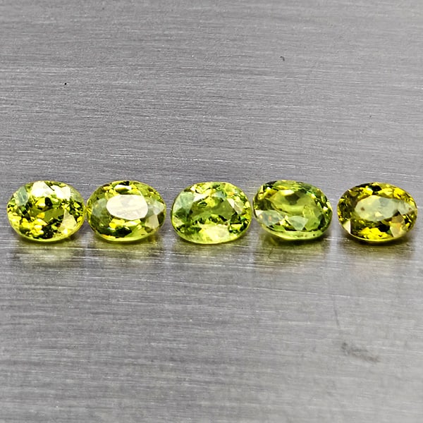 Natural Green Demantiod Garnet Gemstones 1.21 Ct. 5 Pcs. Oval Shape 4.4 x 3.2 Mm.: Product ID: 802937566 Product Name: Natural Demantoid Weight: 1.21 CT. Size: 4.4 x 3.2 x 2.3 MM. Shape: Oval Color: Green Clarity:SI1 Luster: Good Gems Origin: Madagascar Treatment: Unheated Crystal S