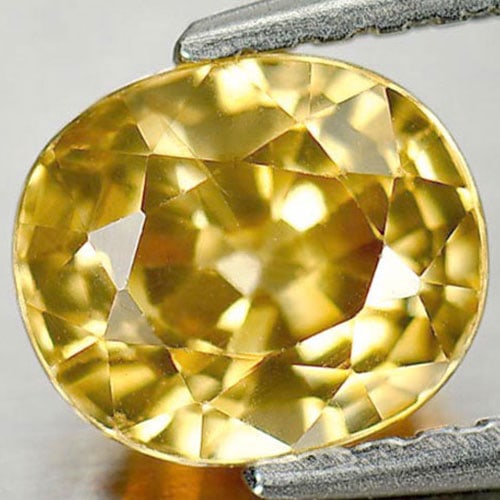 Natural Yellow Zircon Gemstones 1.79 Ct. Oval Shape 6.9 x 5.9 Mm.: Product ID: 807727671 Product Name: Natural Zircon Weight: 1.79 CT. Size: 6.9 x 5.9 x 4.4 MM. Shape: Oval Color: Yellow Clarity:VSI Luster: Very Good Gems Origin: Cambodia Treatment: Heated Crystal St