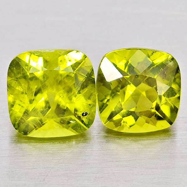Natural Green Peridot Gemstones 2.24 Ct. 2 Pcs. Cushion Shape 5.9 Mm: Product ID: 805317389 Product Name: Natural Peridot Weight: 2.24 CT. Size: 5.9 x 5.9 x 4.3 MM. Shape: Cushion Shape Color: Green Clarity:VSI - SI1 Luster: Good Gems Origin: Pakistan Treatment: Unheate