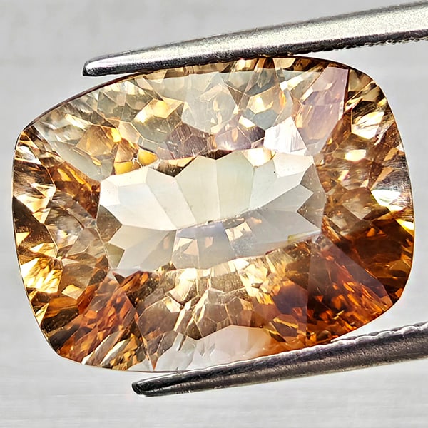Natural Imperial Topaz Gemstones 10.06 Ct. Cushion Concave Cut 11.5 x 14.9 Mm: Product ID: 807168257 Product Name: Natural Topaz Weight: 10.06 CT. Size: 11.5 x 14.9 x 7.7 MM. Shape: Cushion Concave Cut Color: Imperial Clarity:VSI Luster: Very Good Gems Origin: Brazil Treatment: 
