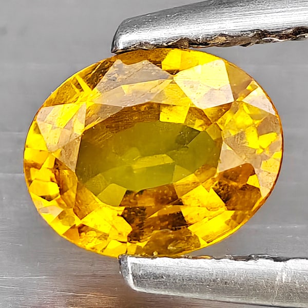 Natural Yellow Sapphire Gemstones 0.61 Ct. Oval Shape 5.8 x 4.9 Mm.: Product ID: 806163032 Product Name: Natural Yellow Sapphire Weight: 0.61 CT. Size: 5.8 x 4.9 x 2.7 MM. Shape: Oval Color: Yellow Clarity:SI1 Luster: Good Gems Origin: Thailand Treatment: Heated Crysta