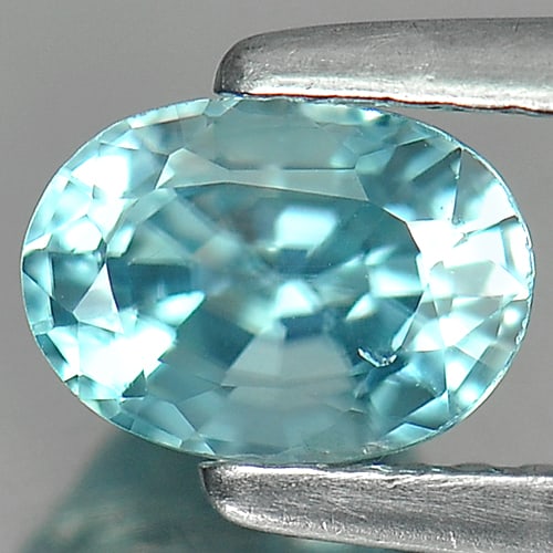 Natural Blue Color Zircon Gemstones 1.26 Ct. Oval Shape 6.5 x 4.8 Mm.: Product ID: 807717071 Product Name: Natural Zircon Weight: 1.26 CT. Size: 6.5 x 4.8 x 4.2 MM. Shape: Oval Color: Blue Clarity:VSI Luster: Good Gems Origin: Cambodia Treatment: Heated Crystal Structure