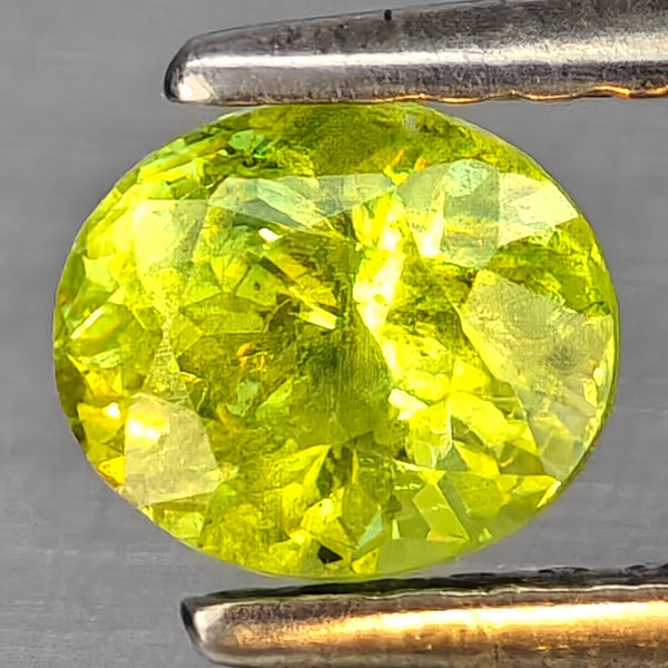 Natural Multi-Color With Rainbow Spark Sphene Gemstones 0.56 Ct. Oval Shape 5.5 x 4.6 Mm: Product ID: 806509315 Product Name: Natural Sphene Weight: 0.56 CT. Size: 5.5 x 4.6 x 3.5 MM. Shape: Oval Color: Multi-Color Clarity:SI1 Luster: Good Gems Origin: Madagascar Treatment: Unheated Crysta