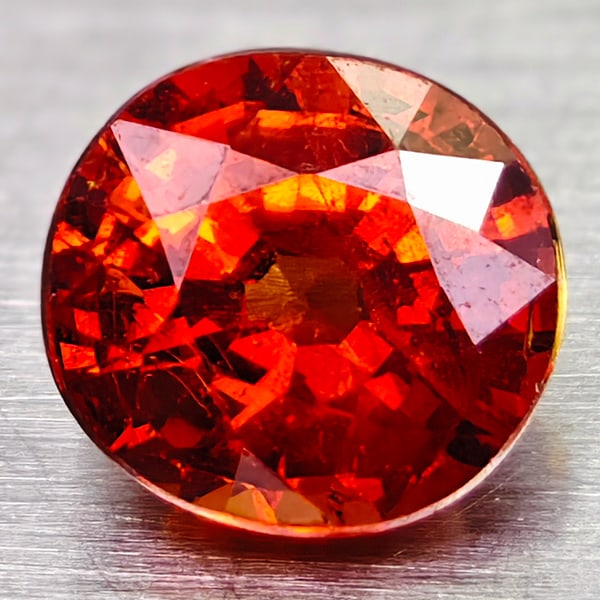Natural Orange Red Spessartine Garnet Gemstones 0.77 Ct. Oval Shape 5.3 x 5 Mm.: Product ID: 102907040 Product Name: Natural Spessartine Weight: 0.77 CT. Size: 5.3 x 5 x 4.3 MM. Shape: Oval Color: Orange Red Clarity:SI Luster: Good Gems Origin: Nigeria Treatment: Unheated Crystal 