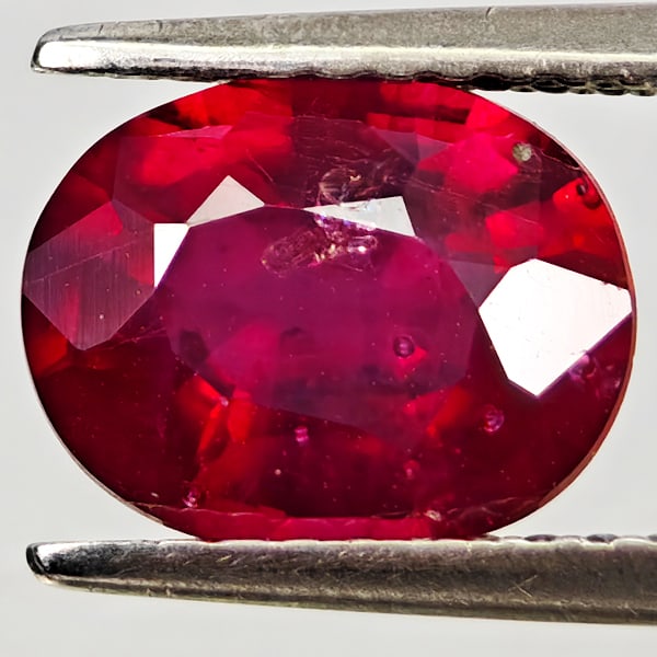 Natural Purplish Red Ruby Gemstones 2.23 Ct. Oval Shape 8.9 x 7 Mm.: Product ID: 805935524 Product Name: Natural Ruby Weight: 2.23 CT. Size: 8.9 x 7 x 4.3 MM. Shape: Oval Color: Purplish Red Clarity:VSI Luster: Good Gems Origin: Madagascar Treatment: Heated (Lead-glass