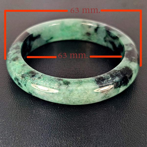 Natural Multi Color Jade Bangle Gemstones 451.40 Ct. Diameter 63 Mm.: Product ID: 819816330 Product Name: Natural Jade Weight: 451.40 CT. Size: 85 x 63 MM. Shape: Round Shape Color: Multi-Color Clarity:Opaque Luster: None Gems Origin: Thailand Treatment: Unheated Crysta