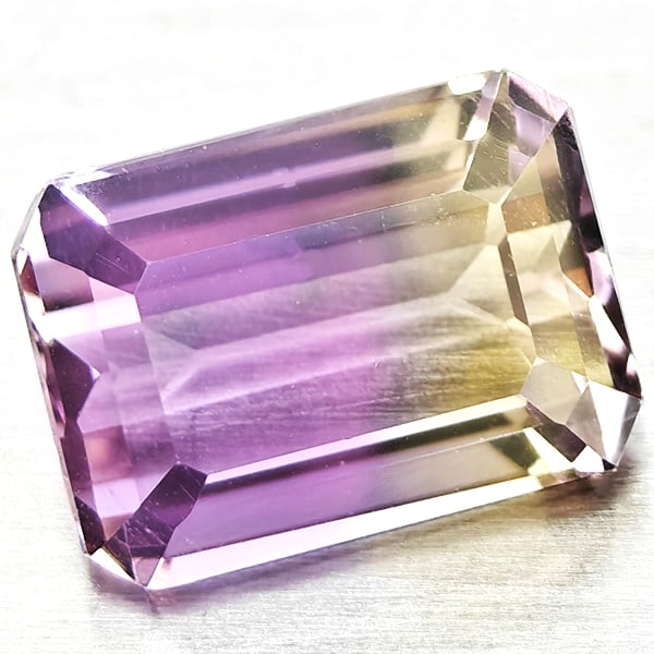 Natural Bi Color Ametrine Gemstones 2.21 Ct. Octagon Shape 8.9 x 6.5 Mm.: Product ID: 800408454 Product Name: Natural Ametrine Weight: 2.21 CT. Size: 8.9 x 6.5 x 4.9 MM. Shape: Octagon Color: Bi Color Clarity:VSI Luster: Good Gems Origin: Bolivia Treatment: Unheated Crystal