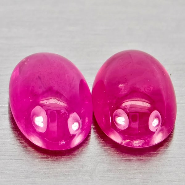Natural Pink Red Jonson Ruby Gemstones 1.21 Ct. 2 Pcs. Oval Cabochon Shape 6 x 4.1 Mm.: Product ID: 805935798 Product Name: Natural Ruby Weight: 1.21 CT. Size: 6 x 4.1 x 2.5 MM. Shape: Oval Cabochon Color: Pink Red Clarity:Semi - Transparent Luster: Good Gems Origin: Mozambique Treatment