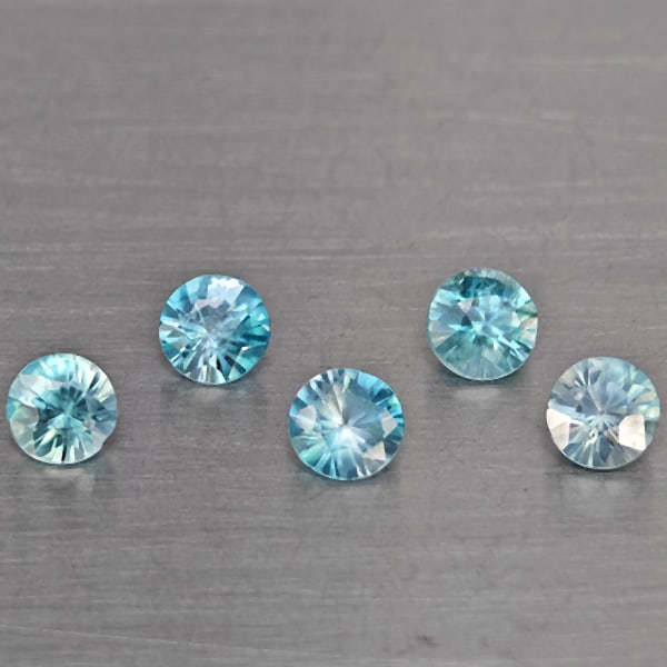 Natural Blue Zircon Gemstones 1.73 Ct. 5 Pcs. Round Diamond Cut 4.6 Mm.: Product ID: 807743274 Product Name: Natural Gemstones Weight: 1.73 CT. Size: 4.2 x 4.2 x 2.9 MM. Shape: Round Diamond Cut Color: Blue Clarity:SI1 Luster: Good Gems Origin: Cambodia Treatment: Heated C