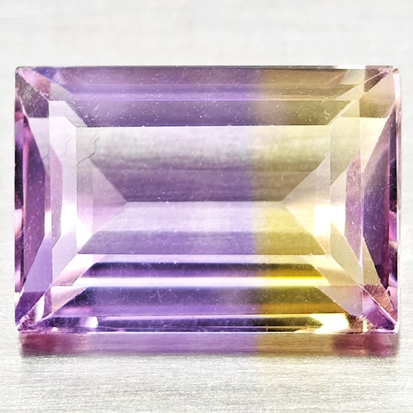 Natural Bi Color Ametrine Gemstones 2.91 Ct. Baguette Shape 10.6 x 7.4 Mm.: Product ID: 800408494 Product Name: Natural Ametrine Weight: 2.91 CT. Size: 10.6 x 7.4 x 4.6 MM. Shape: Baguette Color: Bi Color Clarity:VSI Luster: Good Gems Origin: Bolivia Treatment: Unheated Cryst