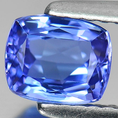 Natural Violetish Blue Tanzanite Gemstones 1.12 Ct. Clean Cushion Shape 6.17 x 5.09 Mm.: Product ID: 107000388 Product Name: Natural Tanzanite Weight: 1.12 CT. Size: 6.17 x 5.09 x 3.79 MM. Shape: Cushion Color: Violetish Blue Clarity:IF Luster: Very Good Gems Origin: Tanzania Treatment: H