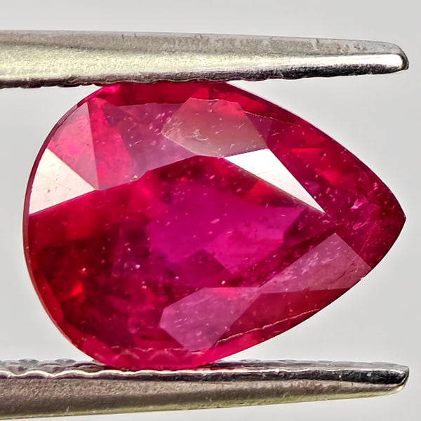 Natural Purplish Red Ruby Gemstones 2.24 Ct. Pear Shape 9 x 7 Mm.: Product ID: 805935569 Product Name: Natural Ruby Weight: 2.24 CT. Size: 9 x 7 x 4.6 MM. Shape: Pear Shape Color: Purplish Pink Clarity:VSI - SI1 Luster: Good Gems Origin: Madagascar Treatment: Heated 