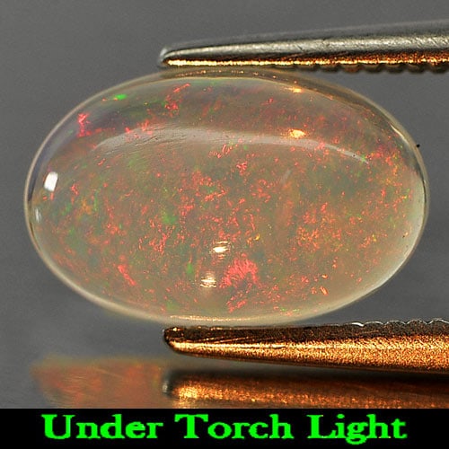 Natural Multi Color Opal Gemstones 1.33 Ct. Oval Cabochon Shape 11.2 x 7.2 Mm.: Product ID: 818724081 Product Name: Natural Opal Weight: 1.33 CT. Size: 11.2 x 7.2 x 3.5 MM. Shape: Oval Cabochon Color: Multi Color Clarity:Semi - Transparent Luster: Strong Iridescent Gems Origin: E