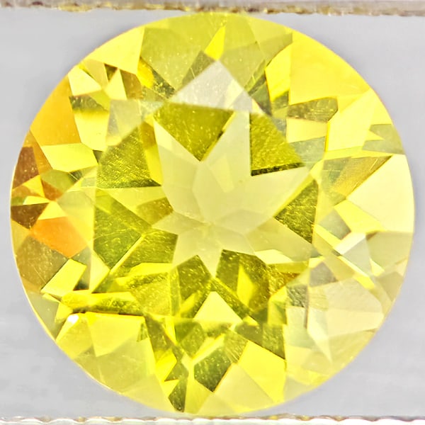 Natural Yellow Lemon Quartz Gemstones 3.82 Ct. Round Shape 10.1 Mm.: Product ID: 805530128 Product Name: Natural Quartz Weight: 3.82 CT. Size: 10.1 x 10.1 x 7 MM. Shape: Round Color: Yellow Lemon Clarity:VSI Luster: Good Gems Origin: Brazil Treatment: Unheated Crystal 