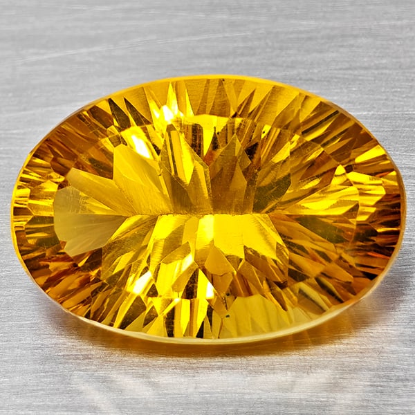Natural Yellow Citrine Gemstones 14.09 Ct. Oval Concave Cut 20 x 13.8 Mm.: Product ID: 801815408 Product Name: Natural Citrine Weight: 14.09 CT. Size: 20 x 13.8 x 9 MM. Shape: Oval Concave Color: Yellow Clarity:VSI Luster: Good Gems Origin: Brazil Treatment: Unheated Crystal