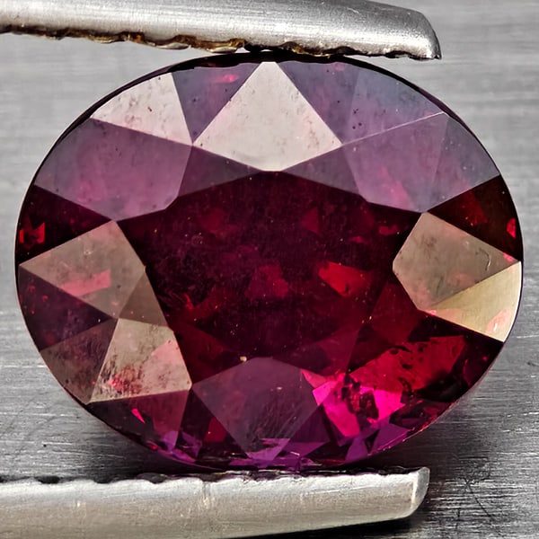 Natural Purplish Red Rhodolite Garnet Gemstones 2.35 Ct. Oval Shape 8.2 x 6.8 Mm.: Product ID: 802937806 Product Name: Natural Rhodolite Weight: 2.35 CT. Size: 8.2 x 6.8 x 6 MM. Shape: Oval Shape Color: Purplish Red Clarity:SI1 Luster: Good Gems Origin: Madagascar Treatment: Unheate