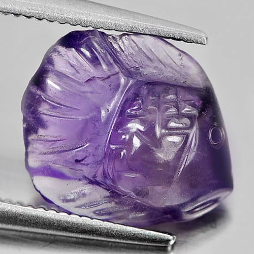 Natural Purple Amethyst Gemstones 2.93 Ct. Fish Carving Shape 12.1 x 10.3 Mm.: Product ID: 810304009 Product Name: Natural Amethyst Weight: 2.93 CT. Size: 12.1 x 10.3 x 4.9 MM. Shape: Fish Carving Color: Purple Clarity:Semi - Transparent Luster: Good Gems Origin: Brazil Treatmen