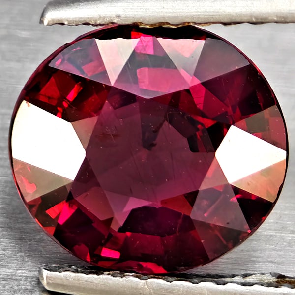 Natural Purplish Red Rhodolite Garnet Gemstones 2.94 Ct. Oval Shape 9.4 x 9 Mm.: Product ID: 802937805 Product Name: Natural Rhodolite Weight: 2.94 CT. Size: 9.4 x 9 x 4.8 MM. Shape: Oval Shape Color: Purplish Red Clarity:VSI Luster: Good Gems Origin: Madagascar Treatment: Unheate