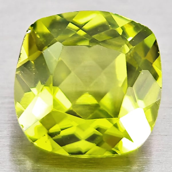 Natural Green Peridot Gemstones 0.92 Ct. Cushion Shape 6 Mm.: Product ID: 805317351 Product Name: Natural Peridot Weight: 0.92 CT. Size: 6 x 6 x 3.5 MM. Shape: Cushion Shape Color: Green Clarity:VSI Luster: Good Gems Origin: Pakistan Treatment: Unheated Crystal 