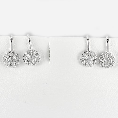 925 Sterling Silver Cuff Earrings Jewelry 2.50 Grams Nice Flower Design: Product ID: 280520112 Product Type: 925 Sterling Silver Fine Jewelry Jewelry Weight: 2.50 Grams. Gemstones Color: Silver Metal: Solid Silver 92.5%. Gemstone Detail: About. 2.50 Grams. Round White CZ S