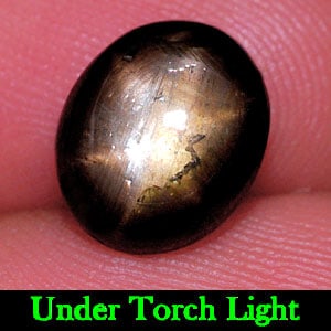 Natural Black Star Sapphire Gemstones 4.02 Ct. Oval Cabochon Shape 10.1 x 8.5 Mm.: Product ID: 806132954 Product Name: Natural Star Sapphire Weight: 4.02 CT. Size: 10.1 x 8.5 x 4 MM. Shape: Oval Cabochon Color: Black Clarity:Opaque Luster: Good 6 Rays Star Gems Origin: Thailand Trea