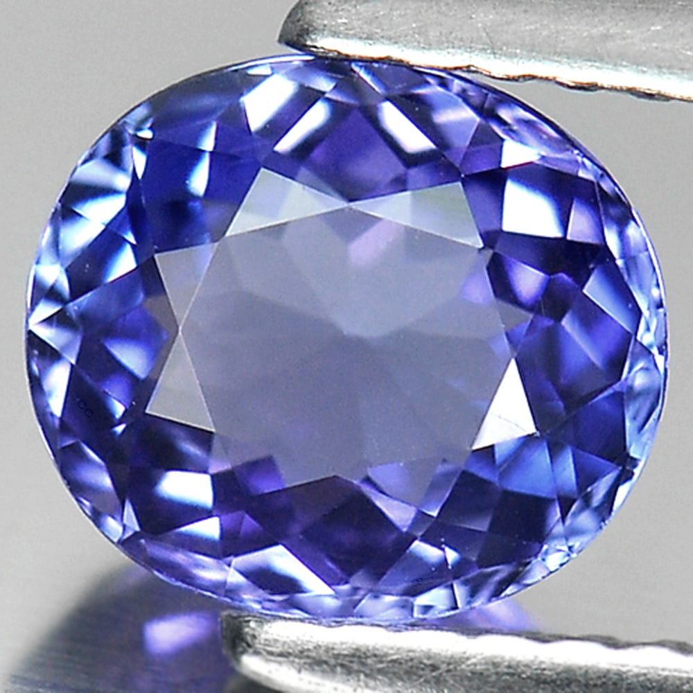 Natural Violetish Blue Tanzanite Gemstones 1.35 Ct. Clean Oval Shape 7.43 x 6.64 Mm.: Product ID: 807006004 Product Name: Natural Tanzanite Weight: 1.35 CT. Size: 7.43 x 6.64 x 3.72 MM. Shape: Oval Color: Blue Clarity:IF Luster: Very Good Gems Origin: Tanzania Treatment: Heated Crystal