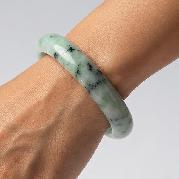 Natural Mutil Color Jade Gemstones Bangle 333.22 Ct. Diameter 55 Mm.: Product ID: 819816143 Product Name: Natural Gemstones Weight: 333.22 CT. Size: 70 x 55 x 3.5 MM. Shape: Round Color: Multi-Color Green Clarity:Opaque Luster: Good Gems Origin: Thailand Treatment: Unhe