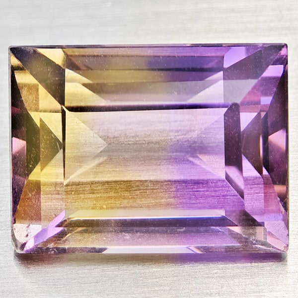 Natural Bi Color Ametrine Gemstones 4.33 Ct. Baguette Shape 10.8 x 8.2 Mm.: Product ID: 800408505 Product Name: Natural Ametrine Weight: 4.33 CT. Size: 10.8 x 8.2 x 6.3 MM. Shape: Baguette Color: Bi Color Clarity:VSI Luster: Good Gems Origin: Bolivia Treatment: Unheated Cryst