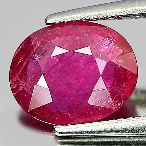 Natural Pinkish Red Ruby Gemstones 1.70 Ct. Oval Shape 8.9 x 7.2 Mm.: Product ID: 805910580 Product Name: Natural Ruby Weight: 1.70 CT. Size: 8.9 x 7.2 x 2.9 MM. Shape: Oval Color: Pinkish Red Clarity:VSI Luster: Good Gems Origin: Madagascar Treatment: Heated (Lead-glas