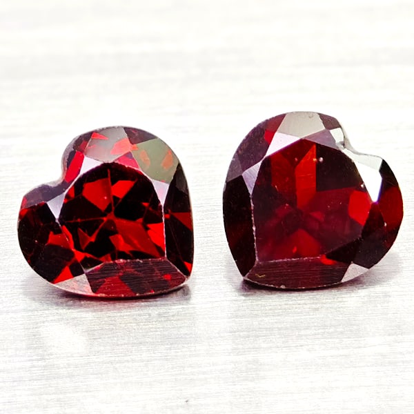 Natural Orangish Red Garnet Gemstones 3.11 Ct. 2 Pcs. Heart Shape 6.9 x 7 Mm.: Product ID: 802936630 Product Name: Natural Red Garnet Weight: 3.11 CT. Size: 7 x 6.9 x 4.3 MM. Shape: Heart Shape Color: Orangish Red Clarity:VSI Luster: Good Gems Origin: Tanzania Treatment: Unheate