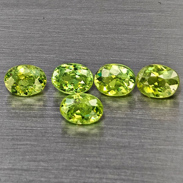 Natural Green Demantiod Garnet Gemstones 1.26 Ct. 5 Pcs. Oval Shape 4.1 x 3.2 Mm.: Product ID: 802937580 Product Name: Natural Demantoid Weight: 1.26 CT. Size: 4.1 x 3.2 x 2 MM. Shape: Oval Color: Green Clarity:SI1 Luster: Good Gems Origin: Madagascar Treatment: Unheated Crystal Str