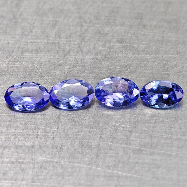Natural Violet Blue Tanzanite Gemstones 1.61 Ct. 4 Pcs. Oval Shape 6.1 x 4 Mm.: Product ID: 807015001 Product Name: Natural Tanzanite Weight: 1.61 CT. Size: 6.1 x 4 x 2.2 MM. Shape: Oval Color: Violet Blue Clarity:VSI Luster: Good Gems Origin: Tanzania Treatment: Heated Crystal S