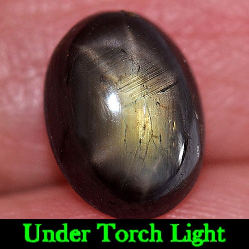 Natural Black Star Sapphire Gemstones 6 Rays 3.97 Ct. Oval Shape 10.2 x 7.6 Mm.: Product ID: 806145725 Product Name: Natural Star Sapphire Weight: 3.97 CT. Size: 10.2 x 7.6 x 4.5 MM. Shape: Oval Cabochon Color: Black Clarity:Opaque Luster: Good 6 Rays Star Gems Origin: Thailand Tr