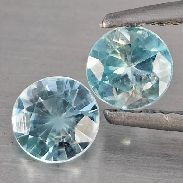 Natural Blue Zircon Gemstones 1.23 Ct. 2 Pcs. Round Diamond Cut 5.1 Mm.: Product ID: 807743249 Product Name: Natural Zircon Weight: 1.23 CT. Size: 5.1 x 5.1 x 3 MM. Shape: Round Diamond Cut Color: Blue Clarity:SI1 Luster: Good Gems Origin: Cambodia Treatment: Heated Crysta