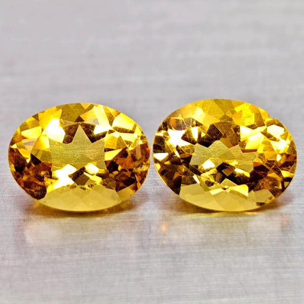 Natural Yellow Citrine Gemstones 3.22 Ct. 2 Pcs. Clean Oval Shape and Mixed Size: Product ID: 801815091 Product Name: Natural Citrine Weight: 3.22 CT. Size: 9 x 6.9 x 4.7 to 9.2 x 7.1 x 4.8 MM. Shape: Oval Color: Yellow Clarity:IF Luster: Good Gems Origin: Brazil Treatment: Unheate