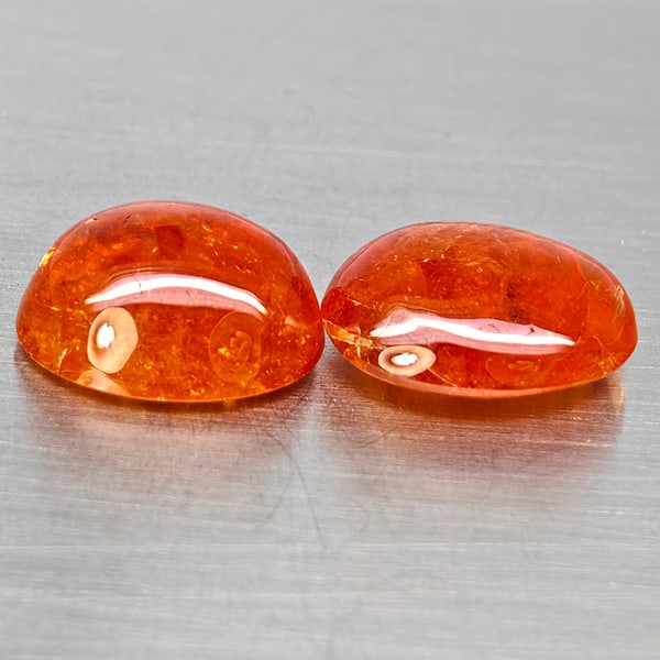 Natural Orangish Red Spessartine Garnet Gemstones 22.47 Ct. 2 Pcs. Oval Cabochon Shape 14.4 x 11.8: Product ID: 802938019 Product Name: Natural Garnet Weight: 22.47 CT. Size: 14.4 x 11.8 x 6.4 MM. Shape: Oval Cabochon Color: Orangish Red Clarity:SI1 Luster: Good Gems Origin: Namibia Treatment: Unhea
