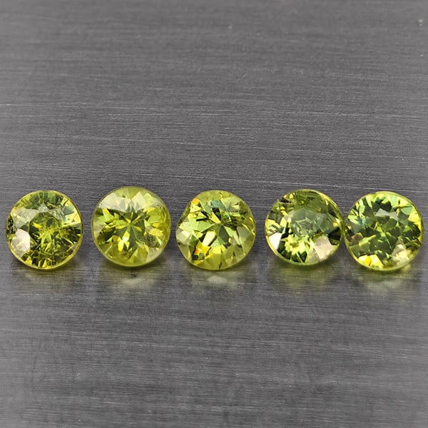 Natural Green Demantiod Garnet Gemstones 0.83 Ct. 5 Pcs. Round Diamond Cut 3.3 Mm.: Product ID: 802937697 Product Name: Natural Demantoid Weight: 0.83 CT. Size: 3.3 x 3.3 x 2.8 MM. Shape: Round Diamond Cut Color: Green Clarity:SI1 Luster: Good Gems Origin: Madagascar Treatment: Unhea