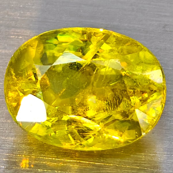 Natural Multi Color Sphene Gemstones Rainbow Spark 1.82 Ct. Oval Shape 7.9 x 6 Mm: Product ID: 806509071 Product Name: Natural Sphene Weight: 1.82 CT. Size: 7.9 x 6 x 4.5 MM. Shape: Oval Color: Multi-Color Clarity:SI1 Luster: Good Gems Origin: Madagascar Treatment: Unheated Crystal 
