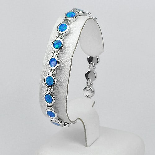 925 Sterling Silver Bracelet Jewelry Length 8 Inch. with Multi Color Blue Created Opal: Product ID: 280160017 Product Type: 925 Sterling Silver Fine Jewelry Jewelry Weight: 17.26 Grams. Gemstones Color: Multi Color Blue Metal: Solid Silver 92.5%. Gemstone Detail: Average Range 17.26 - 17