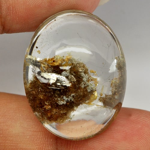 Natural White Brown Moss Quartz Gemstones 59.80 Ct. Oval Cabochon Shape 29 x 23 Mm.: Product ID: 819600756 Product Name: Natural Quartz Weight: 59.80 CT. Size: 29 x 23 x 13.5 MM. Shape: Oval Cabochon Color: White Brown Clarity:Semi - Transparent Luster: Good Gems Origin: Brazil Treatm