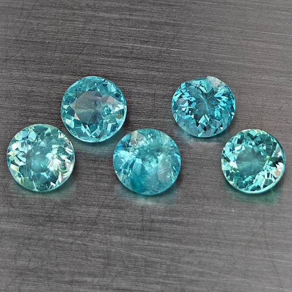 Natural Paraiba Color Apatite Gemstones 2.73 Ct. 5 Pcs. Round Shape 5.3 Mm.: Product ID: 800613772 Product Name: Natural Apatite Weight: 2.73 CT. Size: 5.3 x 5.3 x 3.3 MM. Shape: Round Color: Paraiba Color Clarity:SI1 Luster: Good Gems Origin: Tanzania Treatment: Unheated Crys