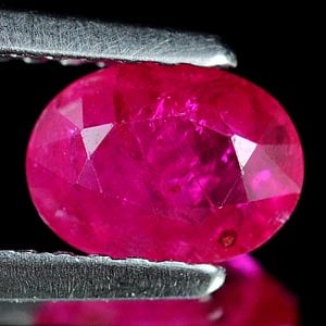 Natural Purplish Pink Ruby Gemstones 0.88 Ct. Oval Shape 6.6 x 4.9 Mm.: Product ID: 805927008 Product Name: Natural Ruby Weight: 0.88 CT. Size: 6.6 x 4.9 x 3 MM. Shape: Oval Color: Purplish Pink Clarity:VSI Luster: Good Gems Origin: Tanzania Treatment: Unheated Crystal St