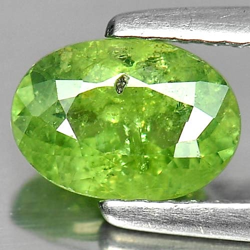 Natural Green Demantoid Garnet Gemstones 1.20 Ct. Oval Shape 7.4 x 5.2 Mm.: Product ID: 802919285 Product Name: Natural Demantoid Weight: 1.20 CT. Size: 7.4 x 5.2 x 3.6 MM. Shape: Oval Color: Green Clarity:SI Luster: Good Gems Origin: Madagascar , Africa Treatment: Unheated C