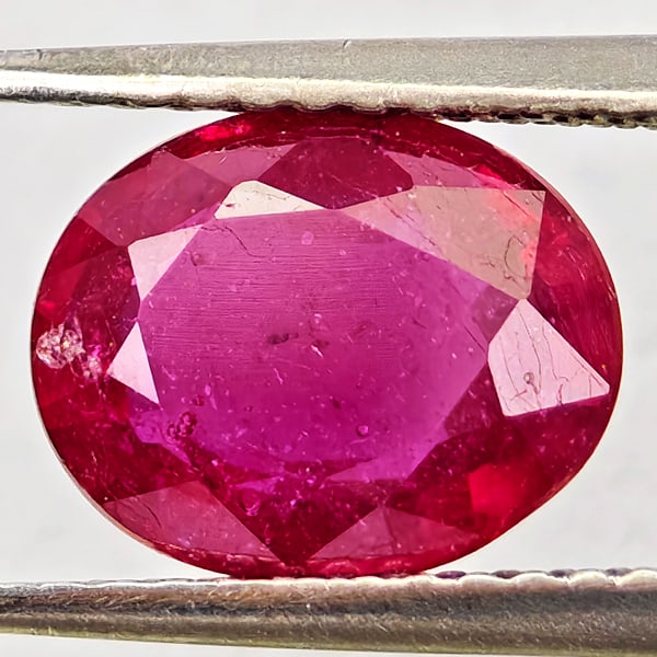 Natural Purplish Red Ruby Gemstones 2.83 Ct. Oval Shape 9.2 x 7.5 Mm.: Product ID: 805935668 Product Name: Natural Ruby Weight: 2.83 CT. Size: 9.2 x 7.5 x 4.3 MM. Shape: Oval Color: Purplish Red Clarity:VSI Luster: Good Gems Origin: Madagascar Treatment: Heated (Lead-gla