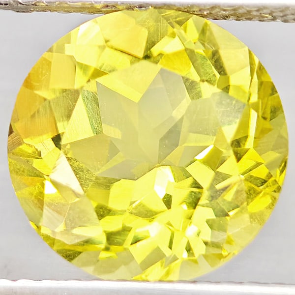 Natural Yellow Lemon Quartz Gemstones 3.93 Ct. Round Shape 10.2 Mm.: Product ID: 805530161 Product Name: Natural Quartz Weight: 3.93 CT. Size: 10.2 x 10.2 x 7.3 MM. Shape: Round Color: Yellow Lemon Clarity:VSI Luster: Good Gems Origin: Brazil Treatment: Unheated Crysta