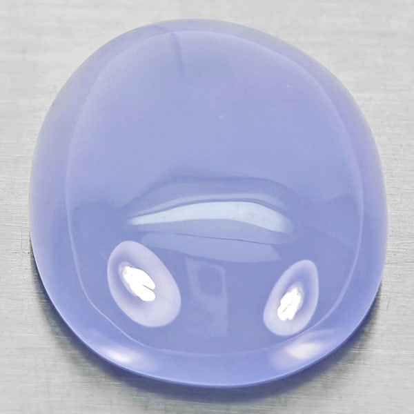 Natural Lavender Chalcedony Gemstones 25.41 Ct. Oval Cabochon Shape 24 x 20 Mm.: Product ID: 801502732 Product Name: Natural Weight: 25.41 CT. Size: 24 x 20 x 6.9 MM. Shape: Oval Cabochon Color: Lavender Clarity:Semi - Transparent Luster: Good Gems Origin: Russia Treatment: Unheat