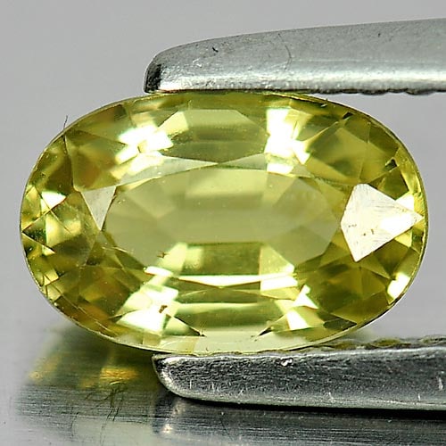 Natural Greenish Yellow Chrysoberyl Gemstones1.26 Ct. Oval Shape 7.7 x 5 Mm.: Product ID: 801701114 Product Name: Natural Chrysoberyl Weight: 1.26 CT. Size: 7.7 x 5 x 3.7 MM. Shape: Oval Color: Yellow Clarity:VSI Luster: Good Gems Origin: Madagascar Treatment: Unheated Crystal 