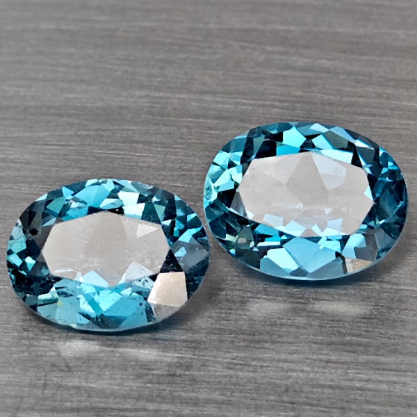 Natural London Blue Topaz Gemstones 3.83 Ct. 2 Pcs. Oval Shape 9.1 x 7 Mm.: Product ID: 807168940 Product Name: Natural Blue Topaz Weight: 3.83 CT. Size: 9.1 x 7 x 4 MM. Shape: Oval Color: London Blue Clarity:VSI Luster: Very Good Gems Origin: Brazil Treatment: Treated Crysta