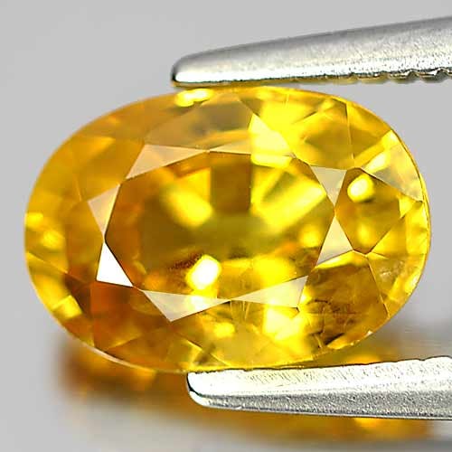 Natural Yellow Sapphire Gemstones 1.88 Ct. Oval Shape 8.4 x 5.9 Mm.: Product ID: 806151543 Product Name: Natural Yellow Sapphire Weight: 1.88 CT. Size: 8.4 x 5.9 x 4.3 MM. Shape: Oval Color: Yellow Clarity:SI1 Luster: Good Gems Origin: Thailand Treatment: Heated Crysta