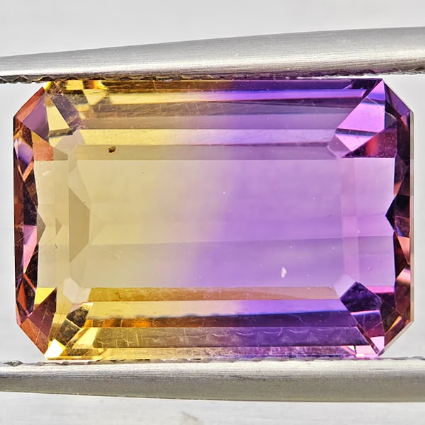 Natural Bi Color Ametrine Gemstones 6.32 Ct. Octagon Shape 13.3 x 9.3 Mm.: Product ID: 800408632 Product Name: Natural Ametrine Weight: 6.32 CT. Size: 13.3 x 9.3 x 6.4 MM. Shape: Octagon Color: Bi Color Clarity:VSI Luster: Good Gems Origin: Bolivia Treatment: Unheated Crysta